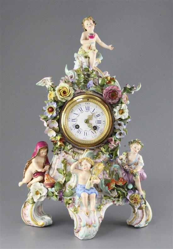 A large Meissen figural mantel clock, late 19th century, height 48cm, slight losses to flowers